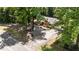 Aerial view of the home with a circular driveway and landscaped front yard at 2005 Cole Mill Rd, Durham, NC 27712