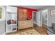 Bedroom with hardwood floors, closet, and view into the bathroom at 2005 Cole Mill Rd, Durham, NC 27712