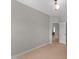 Bedroom featuring light wood floors and an attached bathroom at 2057 Tanners Mill Dr, Durham, NC 27703