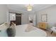 Comfortable bedroom with ensuite bathroom and view to living area at 2057 Tanners Mill Dr, Durham, NC 27703