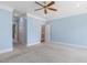 Bright bedroom with carpet, ceiling fan, and neutral paint offers a serene and relaxing ambiance at 206 W Stoneybrook Ct, Benson, NC 27504