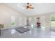 Bright bonus room with skylight, fan, and plenty of natural light from the multiple windows at 206 W Stoneybrook Ct, Benson, NC 27504