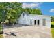 Detached garage with basketball hoop, three bays, attached workshop, exterior door and windows at 206 W Stoneybrook Ct, Benson, NC 27504