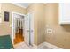 Functional laundry room with neutral tones and convenient access to other areas at 206 W Stoneybrook Ct, Benson, NC 27504