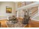 Bright living room with a soaring ceiling, staircase, and open floor plan at 206 W Stoneybrook Ct, Benson, NC 27504