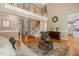 Open-concept living room with high ceilings, staircase, and hardwood floors at 206 W Stoneybrook Ct, Benson, NC 27504