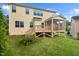 Backyard with a wooden deck and stairs at 210 Strolling Way, Durham, NC 27707