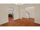 Hardwood dining room adjacent to the kitchen, great for entertaining guests at 210 Strolling Way, Durham, NC 27707