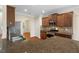 Updated kitchen with granite countertops, stainless steel appliances, and ample cabinet space at 210 Strolling Way, Durham, NC 27707