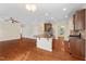 Spacious open-concept living area features hardwood floors and natural light at 210 Strolling Way, Durham, NC 27707