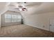 Large bonus room features carpeted floors, vaulted ceiling, and lots of natural light at 2122 Aventon Ln, Morrisville, NC 27560