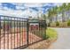 Large dog park within the community, featuring fenced area and signage for residents at 2122 Aventon Ln, Morrisville, NC 27560