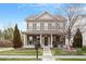 Charming two-story home with inviting front porch and manicured lawn at 2122 Aventon Ln, Morrisville, NC 27560