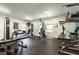 Well-equipped fitness center with a variety of exercise machines and weights for residents at 2122 Aventon Ln, Morrisville, NC 27560