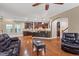 Spacious living room with hardwood floors, connecting seamlessly to the kitchen area at 2122 Aventon Ln, Morrisville, NC 27560