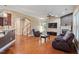 Inviting living room with hardwood floors, fireplace, and comfortable seating area at 2122 Aventon Ln, Morrisville, NC 27560