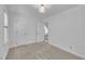 Bedroom featuring neutral carpet, an overhead light, and white walls at 2204 Basil Drive, Raleigh, NC 27612