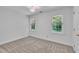 Bedroom featuring carpet, natural light, and white walls at 2204 Basil Drive, Raleigh, NC 27612