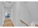 Hallway with hardwood floors leading to a bedroom at 2204 Basil Drive, Raleigh, NC 27612