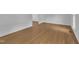 Hallway with wood floors and white walls at 2204 Basil Drive, Raleigh, NC 27612