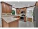 Bright kitchen with quartz countertops, stainless steel appliances, and light wood cabinetry at 2204 Basil Drive, Raleigh, NC 27612