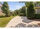 Spacious backyard with a concrete patio and basketball hoop, perfect for outdoor activities and entertainment at 228 Grantwood Dr, Holly Springs, NC 27540