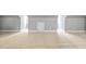 Large, unfinished basement with neutral carpet and gray walls, offering potential for customization and expansion at 228 Grantwood Dr, Holly Springs, NC 27540