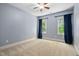 This spacious bedroom features natural light and ample room for furnishings at 228 Grantwood Dr, Holly Springs, NC 27540