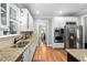 Modern kitchen with stainless steel appliances and ample counter space at 228 Grantwood Dr, Holly Springs, NC 27540