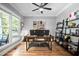 Comfortable office space with lots of light, built in shelving and desk, perfect for working from home at 228 Grantwood Dr, Holly Springs, NC 27540