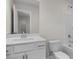 Well-lit bathroom featuring a single sink, modern fixtures, and a shower-tub combo at 267 Old Fashioned Way, Lillington, NC 27546