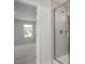 Bathroom featuring glass shower enclosure and neutral color palette at 267 Old Fashioned Way, Lillington, NC 27546