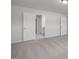 Spacious bedroom with neutral carpet and white doors at 267 Old Fashioned Way, Lillington, NC 27546