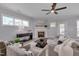Cozy living room with a fireplace, neutral tones, and comfortable seating at 3020 High Plains Dr, Fuquay Varina, NC 27526