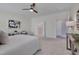 Spacious main bedroom with a ceiling fan and ensuite bathroom access at 3020 High Plains Dr, Fuquay Varina, NC 27526