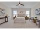 Bright main bedroom with neutral decor, carpet flooring, and natural light at 3020 High Plains Dr, Fuquay Varina, NC 27526
