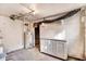 Unfinished basement with a water heater, concrete floor, and storage cabinets at 306 Union Ave, Burlington, NC 27217