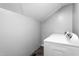 Laundry room featuring a modern washing machine with a white finish at 307 W Austin St, Mebane, NC 27302