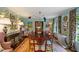 An elegant dining room featuring unique decor and an extended dining table with seating for ten at 3308 Cobblestone Court Ct, Raleigh, NC 27607