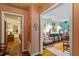 Elegant hallway showcases decorative wallpaper and transitions into beautifully decorated living spaces at 3308 Cobblestone Court Ct, Raleigh, NC 27607
