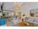 Inviting living room with white walls, vaulted ceiling, modern lighting, and comfortable seating area at 3308 Cobblestone Court Ct, Raleigh, NC 27607