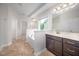 Bright bathroom featuring a soaking tub and a double vanity at 337 Botan Way, Hillsborough, NC 27278