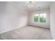 Cozy bedroom with neutral carpet and a window with natural light at 337 Botan Way, Hillsborough, NC 27278