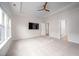 Bright main bedroom with a ceiling fan and views of the backyard at 337 Botan Way, Hillsborough, NC 27278