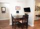 Cozy dining area with a dark table, modern chairs, and stylish decor at 3650 Pleasants Ridge Dr, Wake Forest, NC 27587
