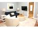 Cozy living room with comfortable seating, stylish decor, and plenty of natural light at 3650 Pleasants Ridge Dr, Wake Forest, NC 27587