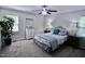 Bedroom with a ceiling fan, large window, and furniture at 3832 Doeskin Dr, Apex, NC 27539