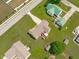 Expansive backyard with a large patio and mature landscaping surrounding the home at 402 S Wilma St, Angier, NC 27501