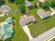Aerial view showcases the spacious property with well-maintained landscaping and multiple outbuildings at 402 S Wilma St, Angier, NC 27501