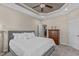 Spacious main bedroom with trey ceiling, plush bed, and ample natural light at 402 S Wilma St, Angier, NC 27501